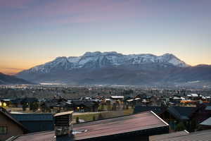 Mountain view featuring nearby suburban area