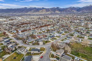 Aerial view of property's location featuring nearby suburban area