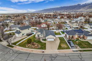 Aerial view of residential area featuring a mountain backdrop