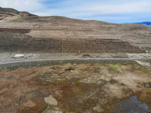 View of mountain background featuring rural landscape