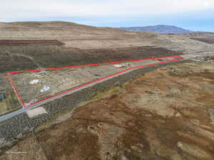 View of rural area featuring property boundaries highlighted and a mountainous background