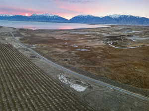 Aerial view at dusk of a water and mountain view