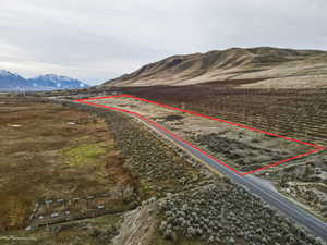 View of mountain backdrop with rural landscape