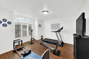 Living room, music room or office featuring LVP floors and crown molding