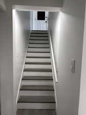 Staircase with wood finished floors