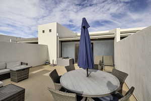 View of patio / terrace with outdoor dining space and an outdoor hangout area