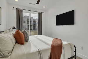 Bedroom with ceiling fan, recessed lighting, and carpet flooring