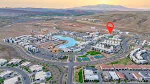 Aerial overview of property's location with a mountainous background