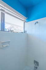 Bathroom with bathtub / shower combination