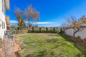 View of fenced backyard