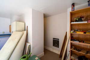Bonus room heating unit and hall to shower