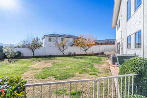 View of fenced backyard