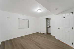 Unfurnished bedroom with light wood-style floors and a closet
