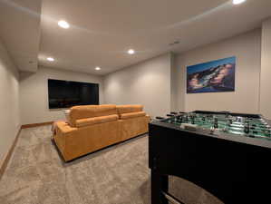 Rec room with recessed lighting and carpet flooring