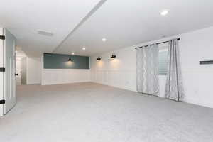 Family room featuring light colored carpet