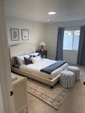 Photos are of staged model home. Secondary Suite Bedroom with carpet flooring