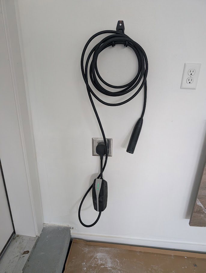 Garage view of electric vehicle charger
