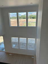 Empty room featuring wood finished floors and baseboards