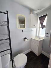 Bathroom with vanity and a shower with door