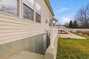 View of side of property featuring a patio