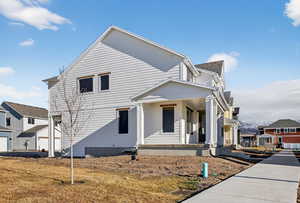 View of front of property with covered porch