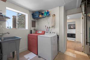 Washroom featuring separate washer and dryer