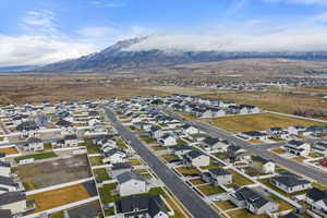 View of property location featuring nearby suburban area and a mountainous background