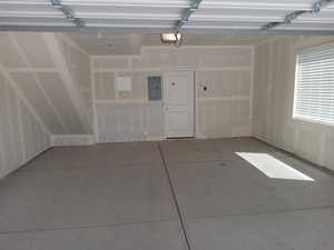 Garage featuring electric panel