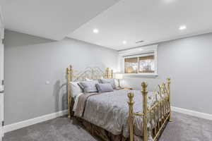 Bedroom featuring carpet flooring and recessed lighting
