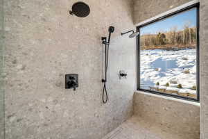 Bathroom view of a tile shower