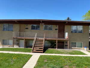 View of apartment building / complex featuring stairway