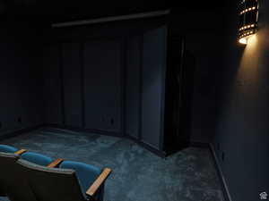 Interior space featuring baseboards and carpet floors