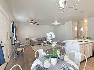 Dining room featuring wood finished floors and a ceiling fan