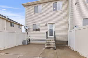Enclosed backyard with gate to garage.