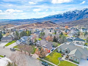 Aerial view of residential area with mountains