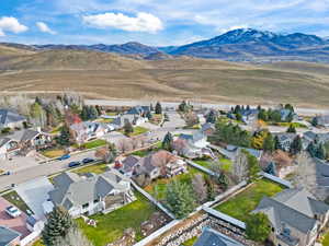 Aerial view of residential area with a mountainous background