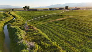 Aerial view of sparsely populated area with a mountain backdrop