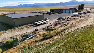 Aerial view of sparsely populated area with a mountainous background