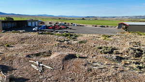 View of mountain background featuring rural landscape