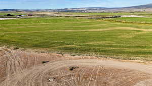 Aerial view of sparsely populated area featuring a mountainous background