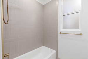 Bathroom with shower / tub combination