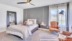 Bedroom with carpet floors and ceiling fan