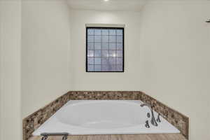 Bathroom featuring a bath