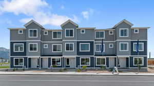View of front of house featuring a residential view and board and batten siding