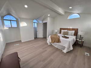 Bedroom featuring light wood-style floors and recessed lighting