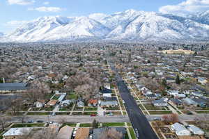 View of property location featuring nearby suburban area and a mountainous background