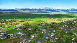 Overview of rural landscape with mountains and farmland