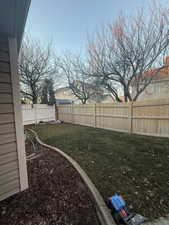 View of fenced backyard