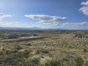 View of mountain background featuring rural landscape