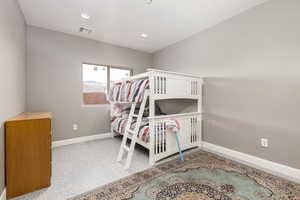 Bedroom featuring baseboards